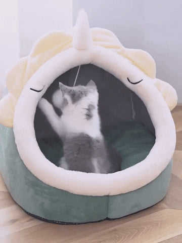 A cozy cat house with a deep sleep bed and warm basket